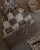 Checkerboard bobble hat beanie by Art Disco in Whitby, North Yorkshire