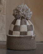 Checkerboard bobble hat beanie by Art Disco in Whitby, North Yorkshire