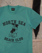 North Sea Beach Club Turquoise T-Shirt by ART DISCO Original Goods