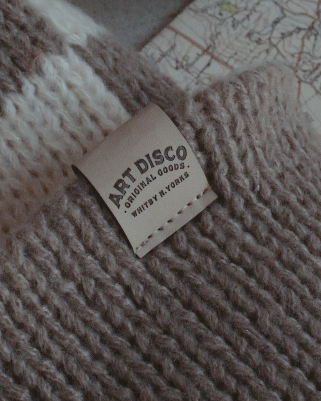 Checkerboard bobble hat beanie by Art Disco in Whitby, North Yorkshire